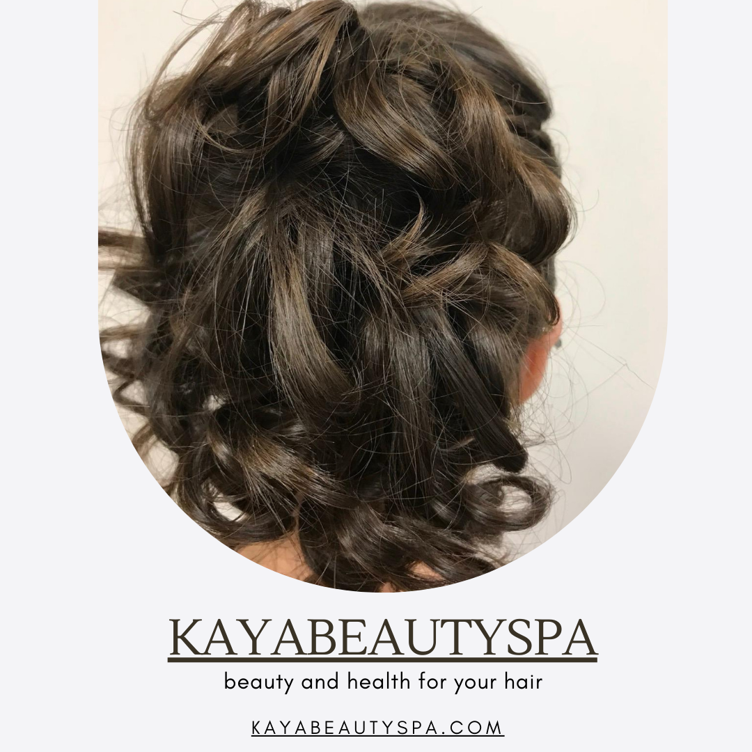 A serene spa environment with soft lighting, comfortable seating, and lush greenery, inviting guests to relax and rejuvenate at Kaya Beauty Spa."